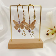 Boucles d'oreilles papillon rose dorées, améthyste & polymère