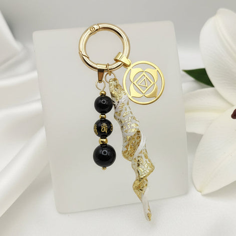 Bijou de sac protection obsidienne et tourmaline noire