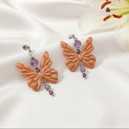 Boucles d'oreilles argentées papillon, Améthyste et polymère