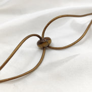 Bracelet en cuir doré et son œil de tigre 16/17 cm