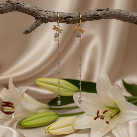 boucle d'oreilles fait mains